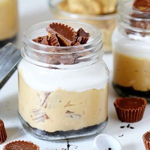 Reese's Peanut Butter Cheesecake in a Jar with Oreo crust! Reese's Peanut Butter Cheesecake in a Jar with Oreo crust!
